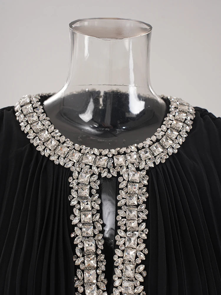Robe épissée des diamants de plumes à plis à ruche