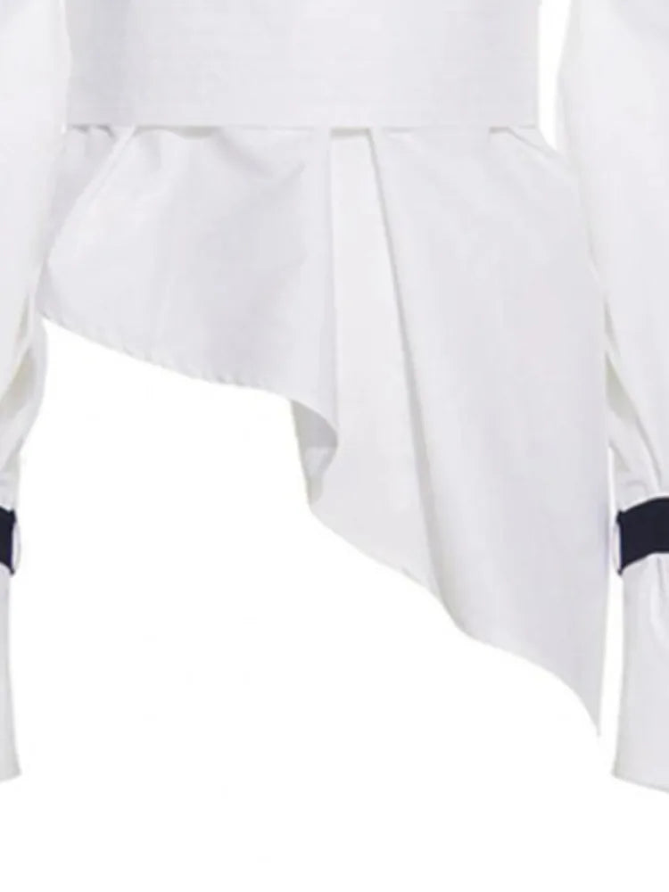 Chemisier à manches bouffantes blanches chics