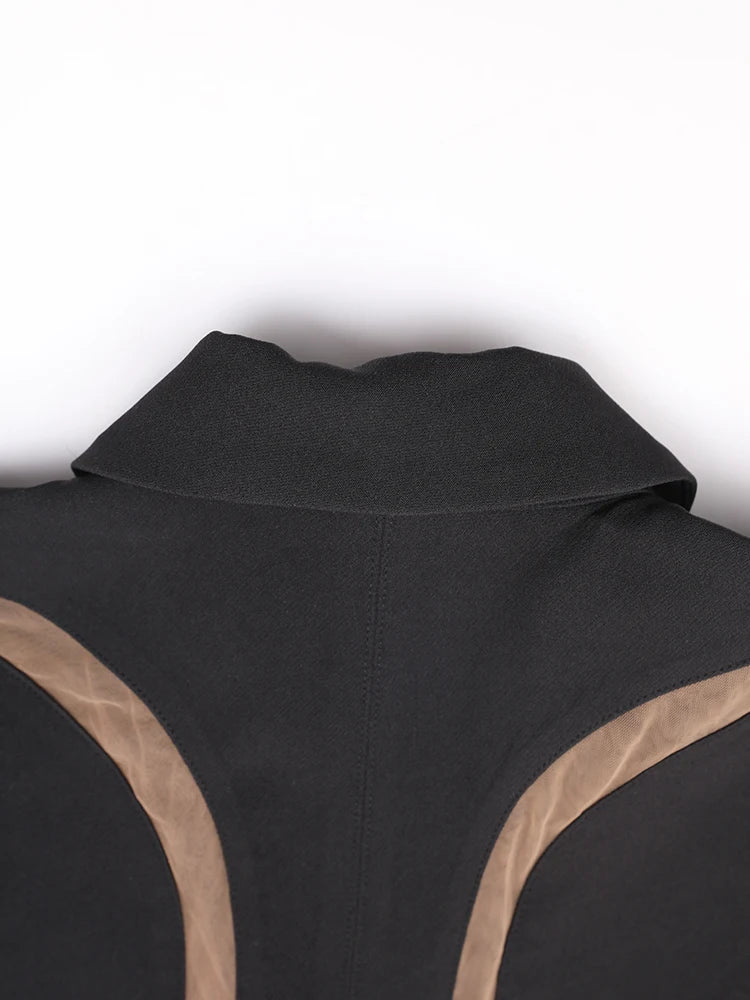 Vestes de revers courtes des femmes