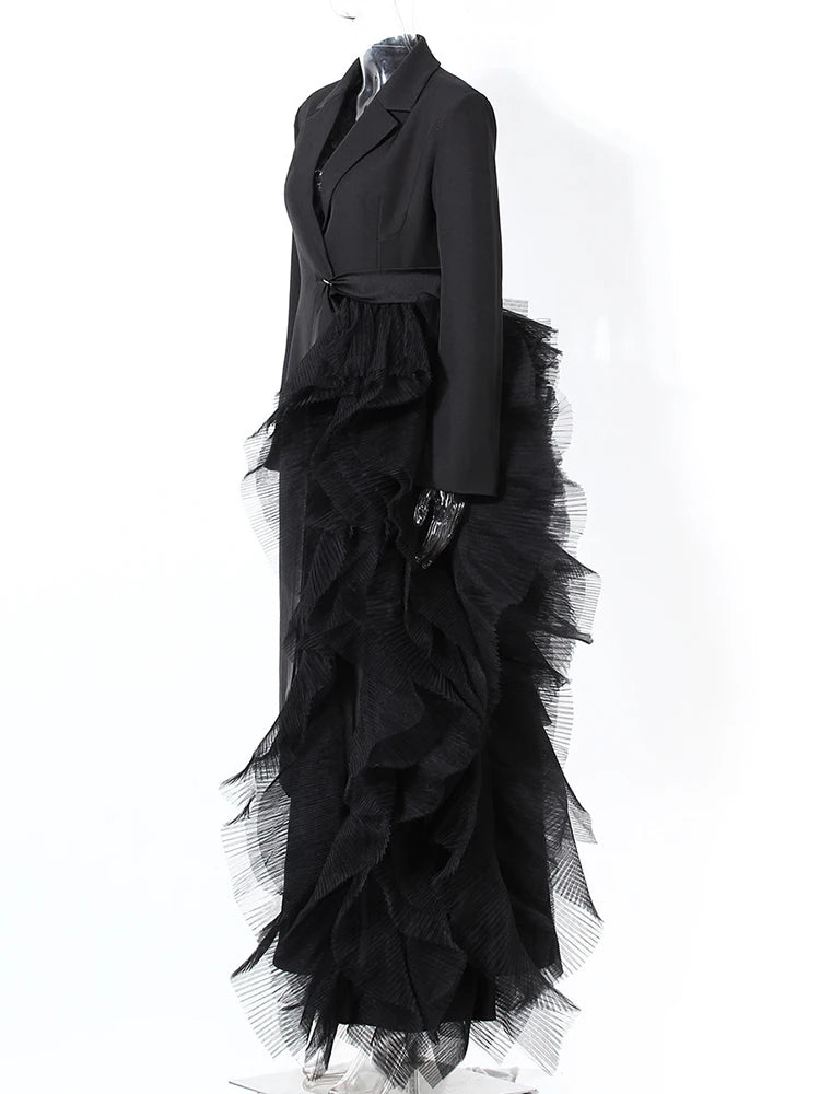 Veste longue maille irrégulière noire