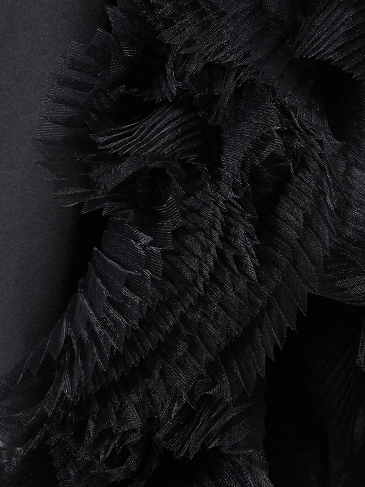 Veste longue maille irrégulière noire