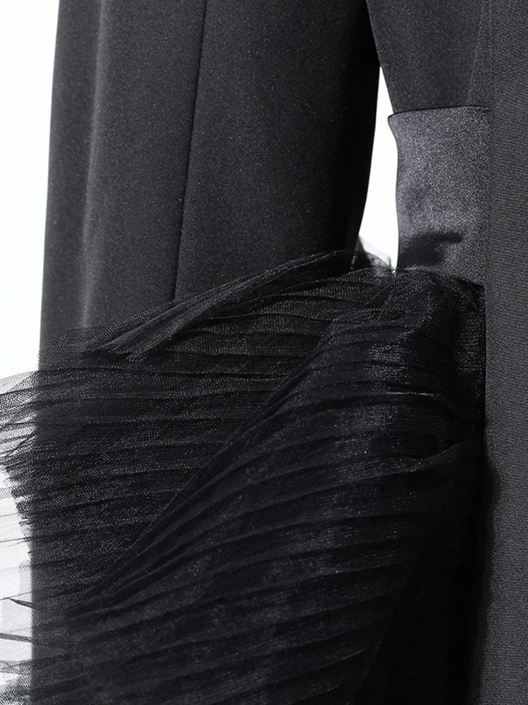 Veste longue maille irrégulière noire
