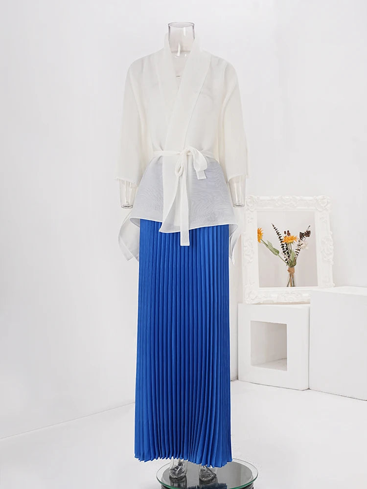 Blouse plissée et jeu de jupe