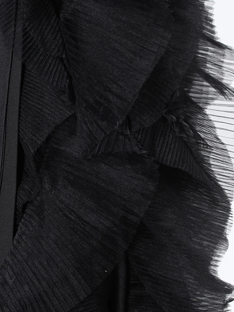 Veste longue maille irrégulière noire