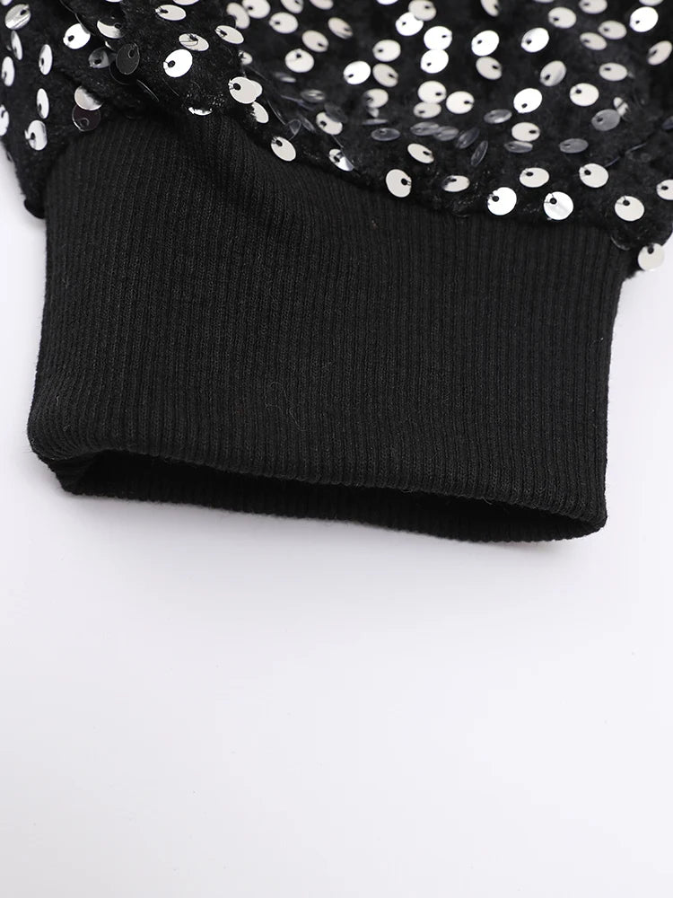 Veste à paillettes noires