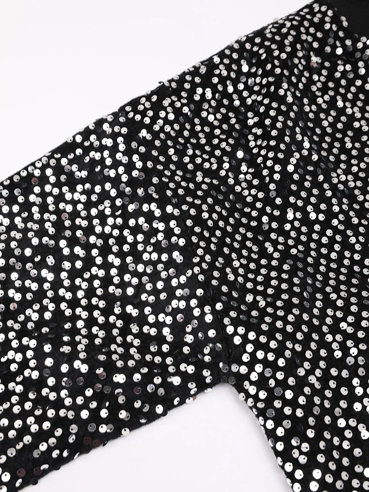 Veste à paillettes noires