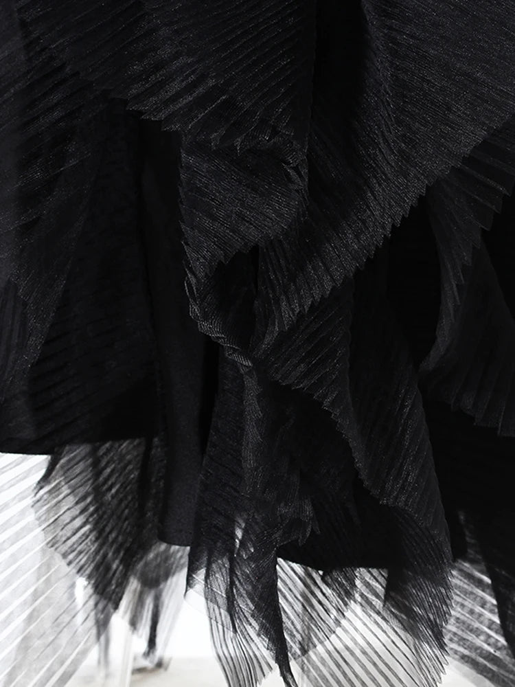 Veste longue maille irrégulière noire