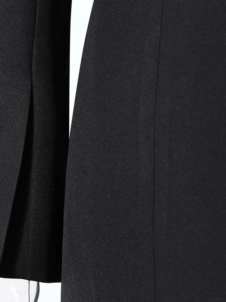 Veste longue maille irrégulière noire