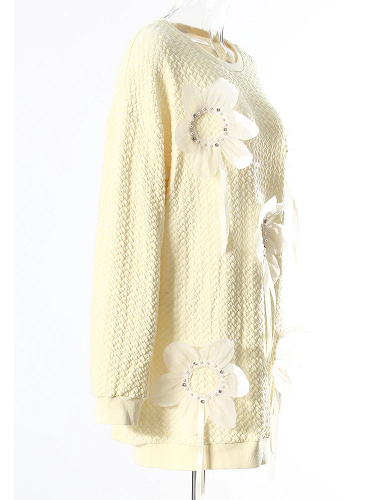 Pull à perles florales
