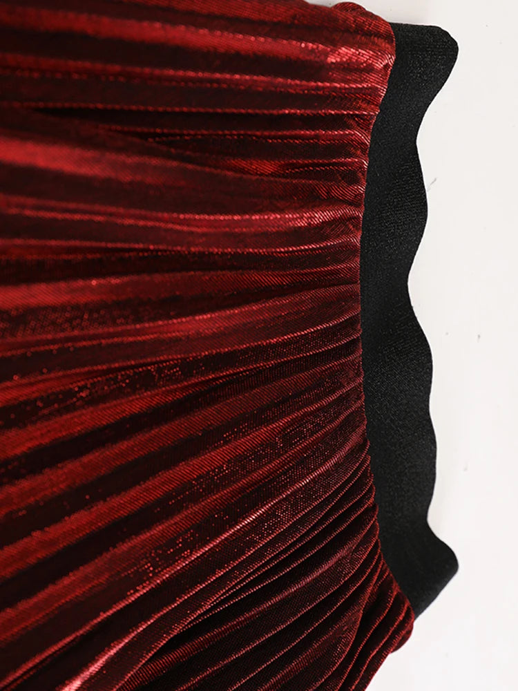 Taille élastique haute jupe plissée irrégulière