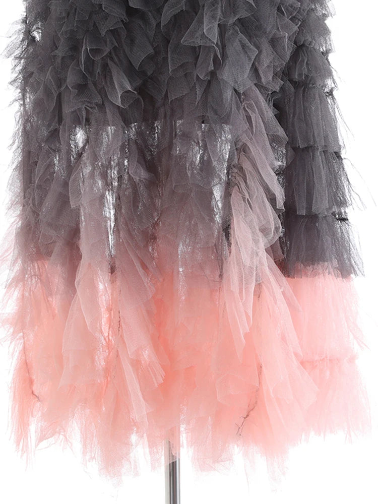 Jupe midi à volants rose gris