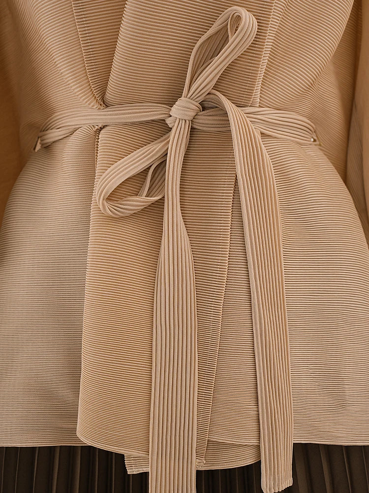 Blouse plissée et jeu de jupe