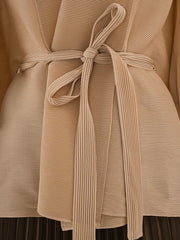 Blouse plissée et jeu de jupe