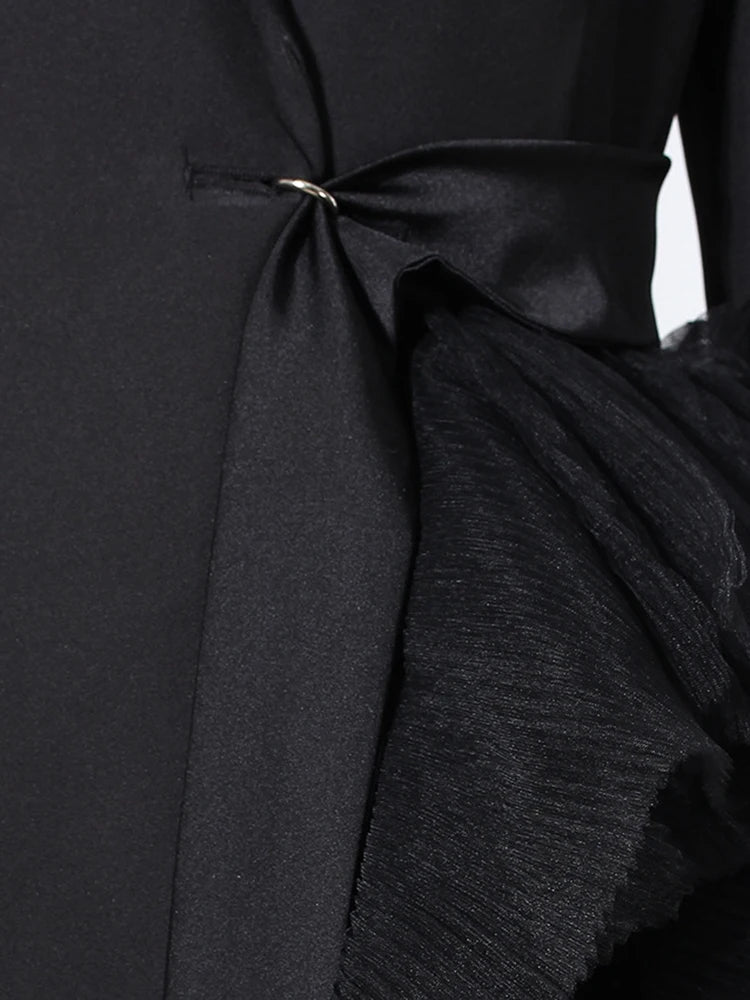 Veste longue maille irrégulière noire