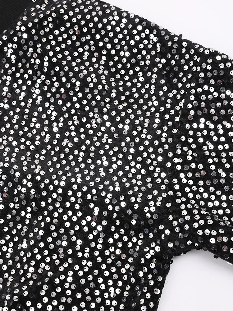 Veste à paillettes noires