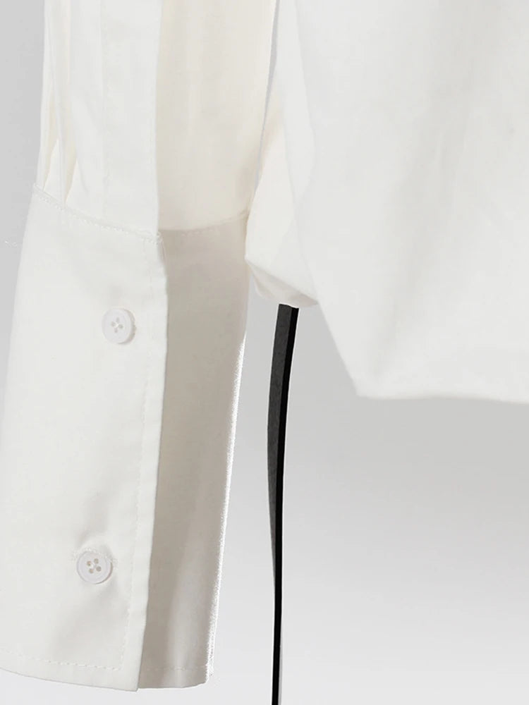 Chemisier plissé blanc élégant