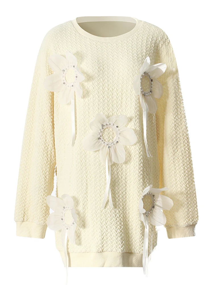 Pull à perles florales