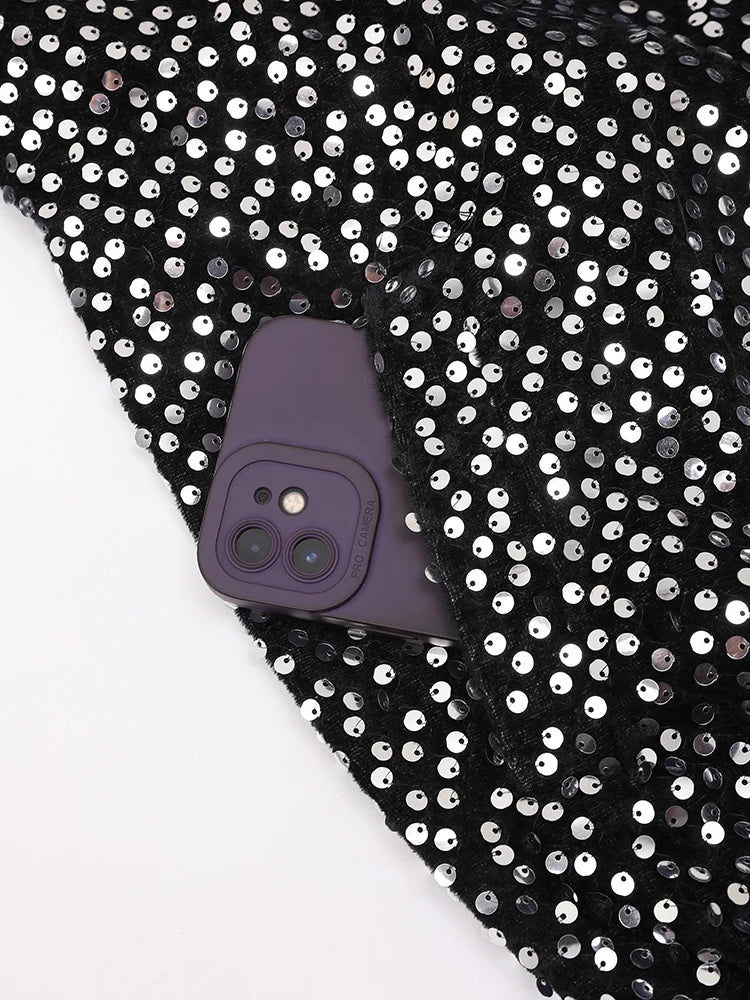 Veste à paillettes noires